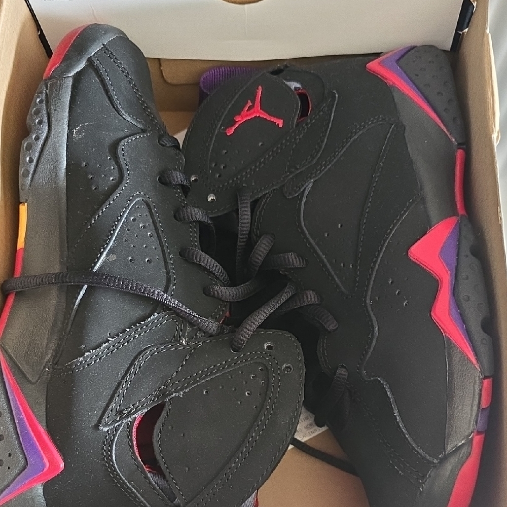 Jordan Black and Red Sneakers with Bold Design